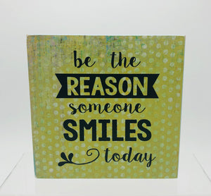 'Be the Reason Someone Smiles Today' Sign